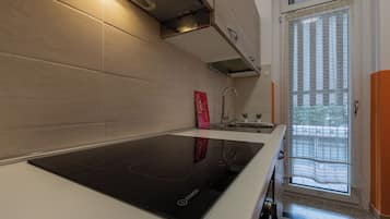 Apartment, Balcony | Private kitchen | Espresso maker, electric kettle