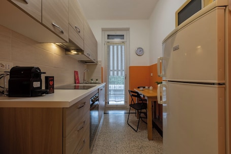 Apartment, Balcony | Private kitchen | Espresso maker, electric kettle