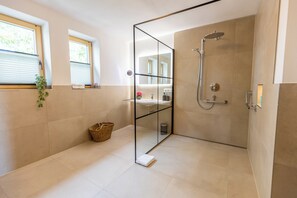 Shower, hair dryer, towels, soap