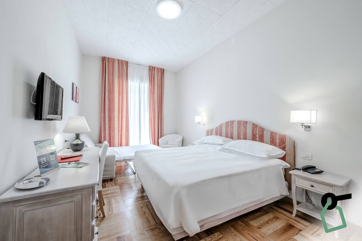 Comfort Triple Room, Multiple Beds, Private Bathroom, Partial Sea View | Minibar, in-room safe, desk, free WiFi