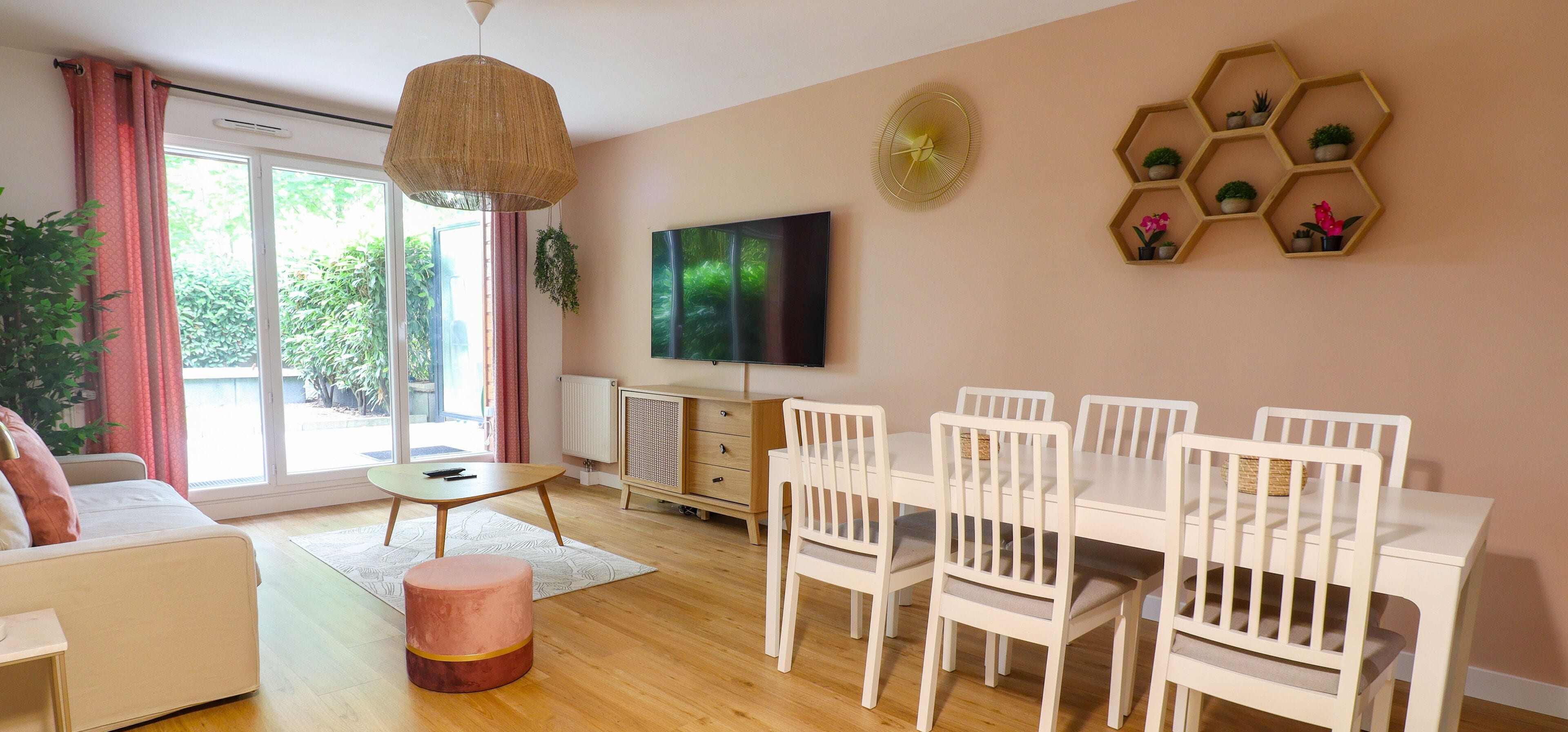 Deluxe Apartment, Garden View | Living area | 119-cm Smart TV with digital channels