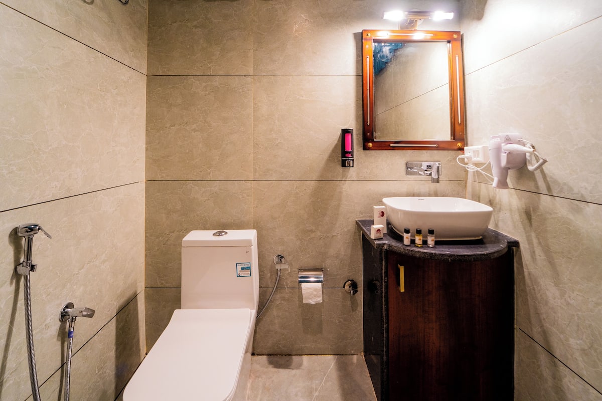 Shower, slippers, towels, soap