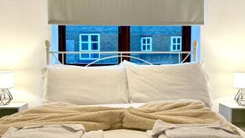 1 bedroom, desk, iron/ironing board, travel cot