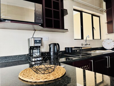 Cozy 2-bedroom apartment in the busy city of Gaborone with WiFi and A/C