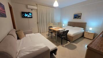 Family Studio, 1 Queen Bed with Sofa bed, Balcony, City View | Desk, free WiFi, bed sheets