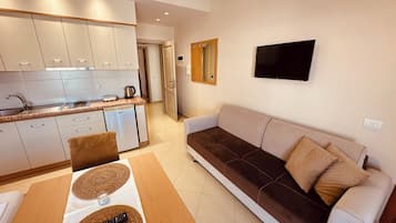 Family Studio, 1 Queen Bed with Sofa bed, Balcony, City View | Desk, WiFi (free), bed sheets