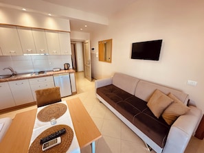 Family Studio, 1 Queen Bed with Sofa bed, Balcony, City View
