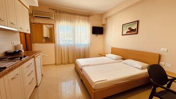 Classic Studio, City View | Desk, free WiFi, bed sheets