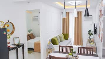 1 bedroom, desk, iron/ironing board, travel crib