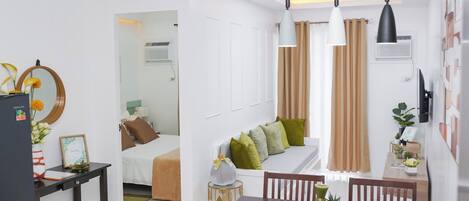 1 bedroom, desk, iron/ironing board, travel crib