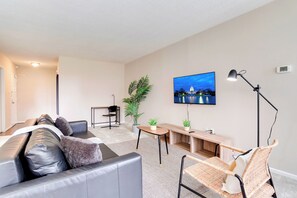 Apartment, Balcony, Pool View | Living area | 50-inch plasma TV with cable channels - Modern Apartment with Top Amenities (Arlington)