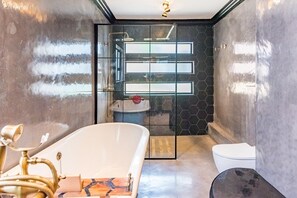 Luxury Suite, Pool View | Bathroom | Separate tub and shower, toilet paper
