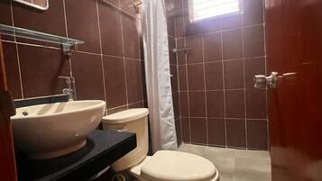 Junior Apartment | Bathroom | Shower, towels, soap, shampoo
