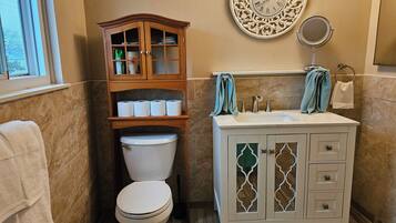 Hair dryer, towels, soap, toilet paper