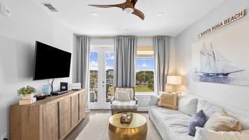 Condo, Multiple Beds (Gulf Place Residences 203) | Living area | TV