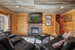 Smart TV, fireplace, foosball, books