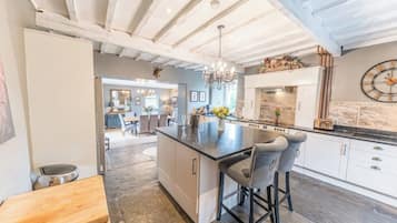 Dishwasher, high chair, cookware/dishes/utensils, dining tables