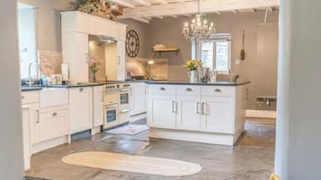 Dishwasher, high chair, cookware/dishes/utensils, dining tables