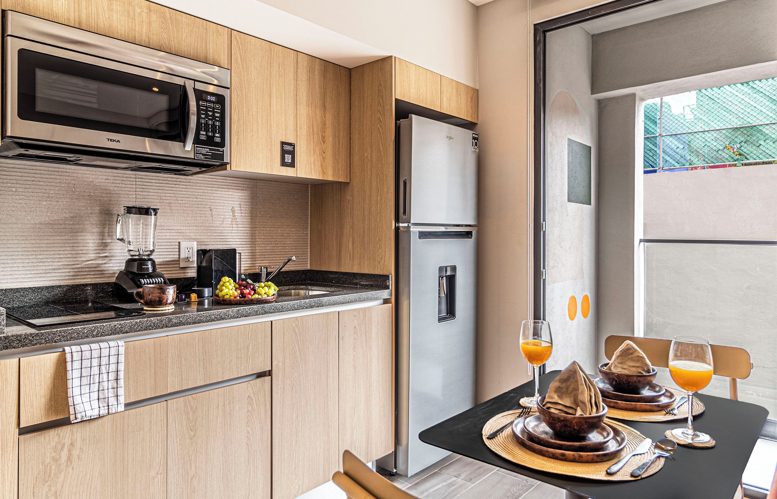 Premier Apartment, Balcony, City View | Private kitchen | Fridge, microwave, stovetop, blender