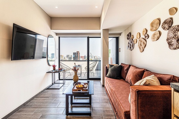 Senior Apartment | Living area | 50-inch Smart TV with cable channels