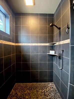 Shower, hair dryer, towels, soap