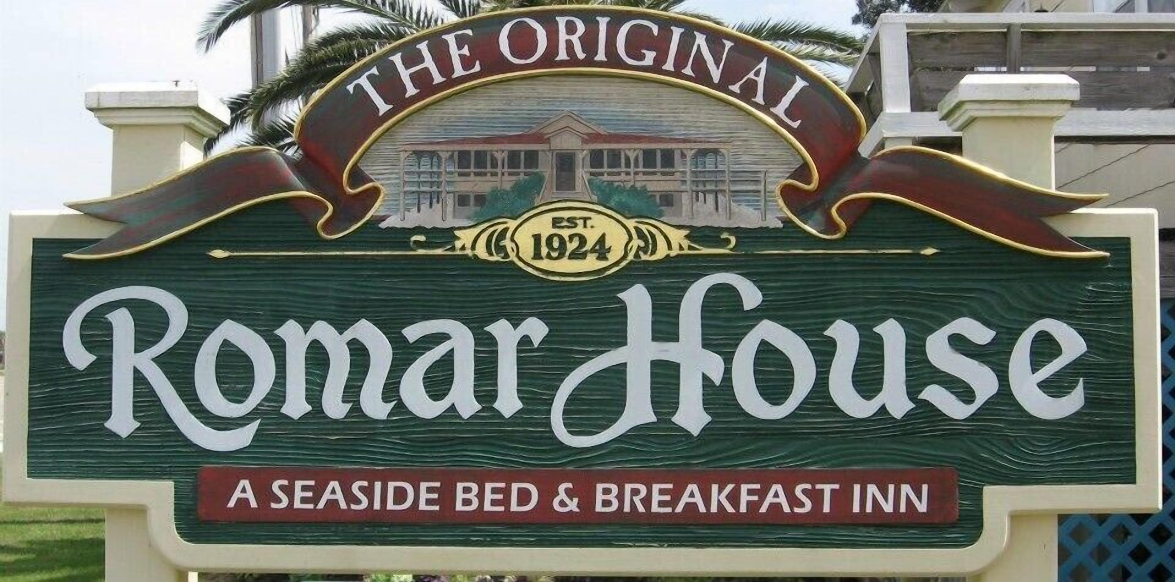 A sign for Romar House, a seaside bed and breakfast inn established in 1924.