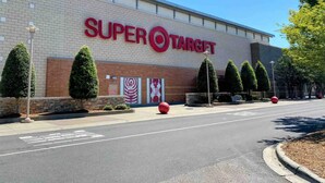 A Super Target store with a brick facade, large signage, and landscaped areas with trimmed bushes. - Charming Charlotte 3-bedroom house, Fenced Yard, 5 Mins to Carowinds, WiFi, Pets (Charlotte)