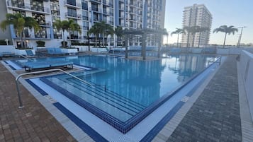Outdoor pool, pool umbrellas, pool loungers