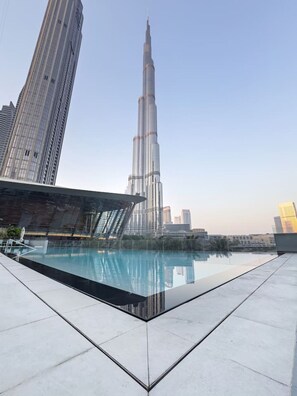 Pool - Skyline Aria 2BR | Burj & Fountain Views I PS5 (Dubai)