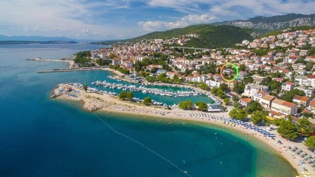 An aerial view of a coastal town with a marina, beach, and residential buildings. - Fashonable and Trendy Apartments Crikvenica - Studio Apartment with Balcony (Crikvenica)