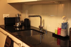 Mikrovågsugn, ugn, spishäll och diskmaskin