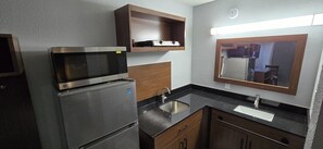 Full-sized fridge, microwave, cookware/dishes/utensils, dining tables - HomeTowne Studios by Red Roof LaGrange (LaGrange)
