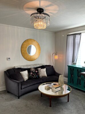 TV, fireplace, books