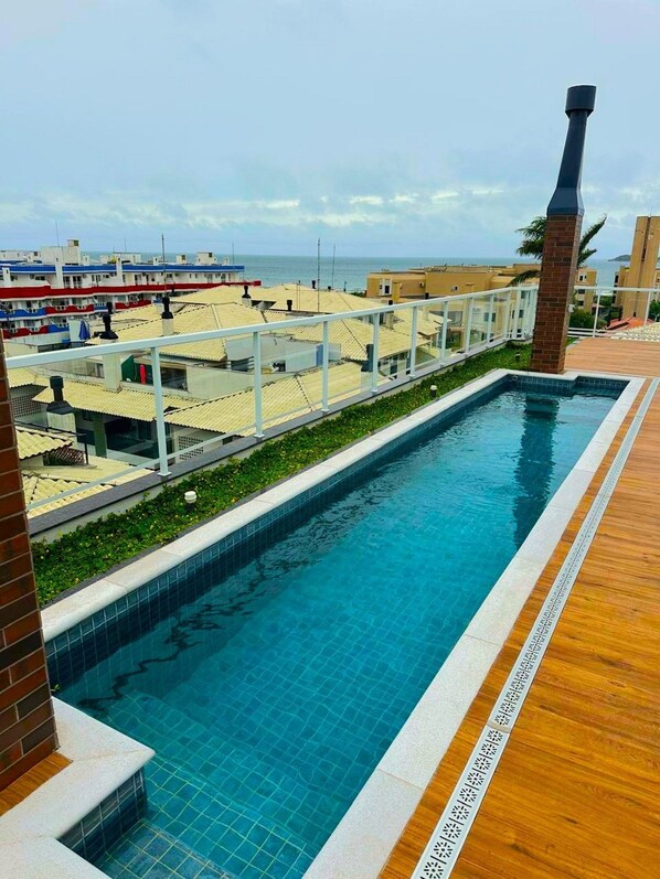 Deluxe Apartment, Pool Access | Pool | Outdoor pool, sun loungers - Ap Santorini Residence com Piscina (Florianópolis)