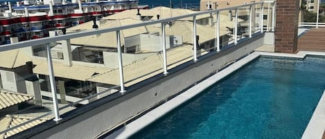 Deluxe Apartment, Pool Access | Pool | Outdoor pool, pool loungers