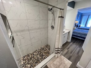 Hair dryer, towels, soap, shampoo