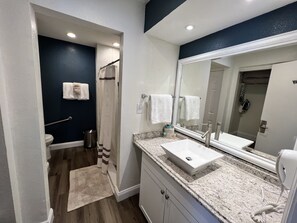 Hair dryer, towels, soap, shampoo