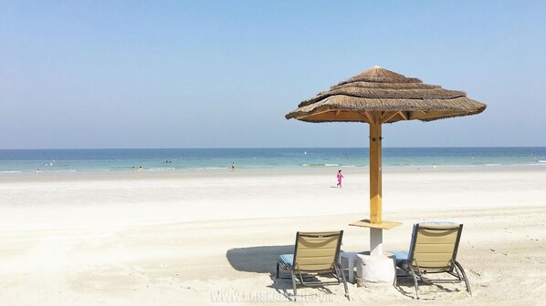 Chaise longue, serviettes de plage
