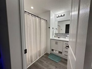 Hair dryer, towels, soap, toilet paper