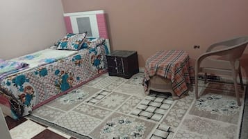 Kamar Single Comfort | Tirai kedap cahaya, setrika/meja setrika, dan Wi-Fi gratis