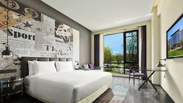 Enkeltrom, hageutsikt | Blendingsgardiner, strykejern/-brett og wi-fi (inkludert)