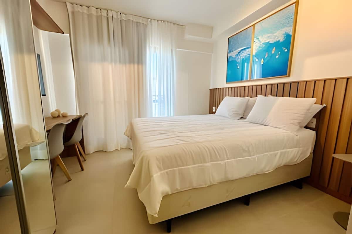 1 bedroom, laptop workspace, blackout drapes, iron/ironing board