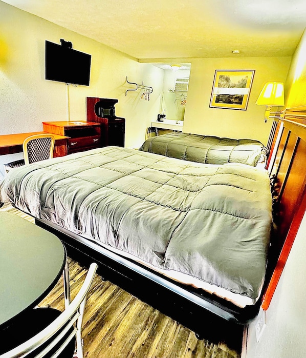 Desk, laptop workspace, free WiFi, bed sheets