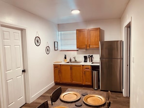 Fridge, stovetop, coffee/tea maker, toaster