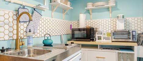 Fridge, microwave, stovetop, coffee/tea maker