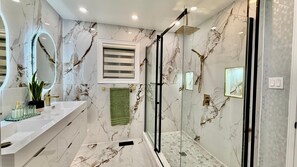 Shower, hair dryer, towels, soap