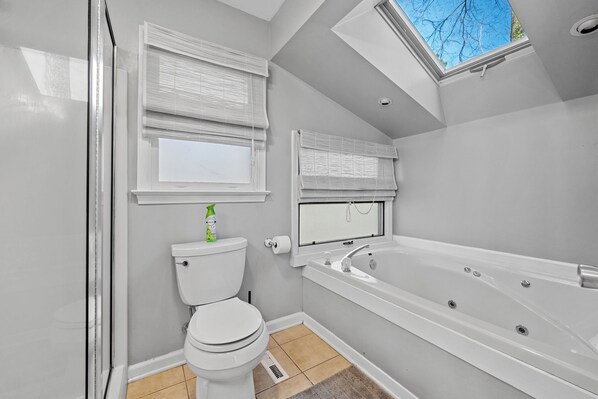 Jetted tub, towels, soap, toilet paper