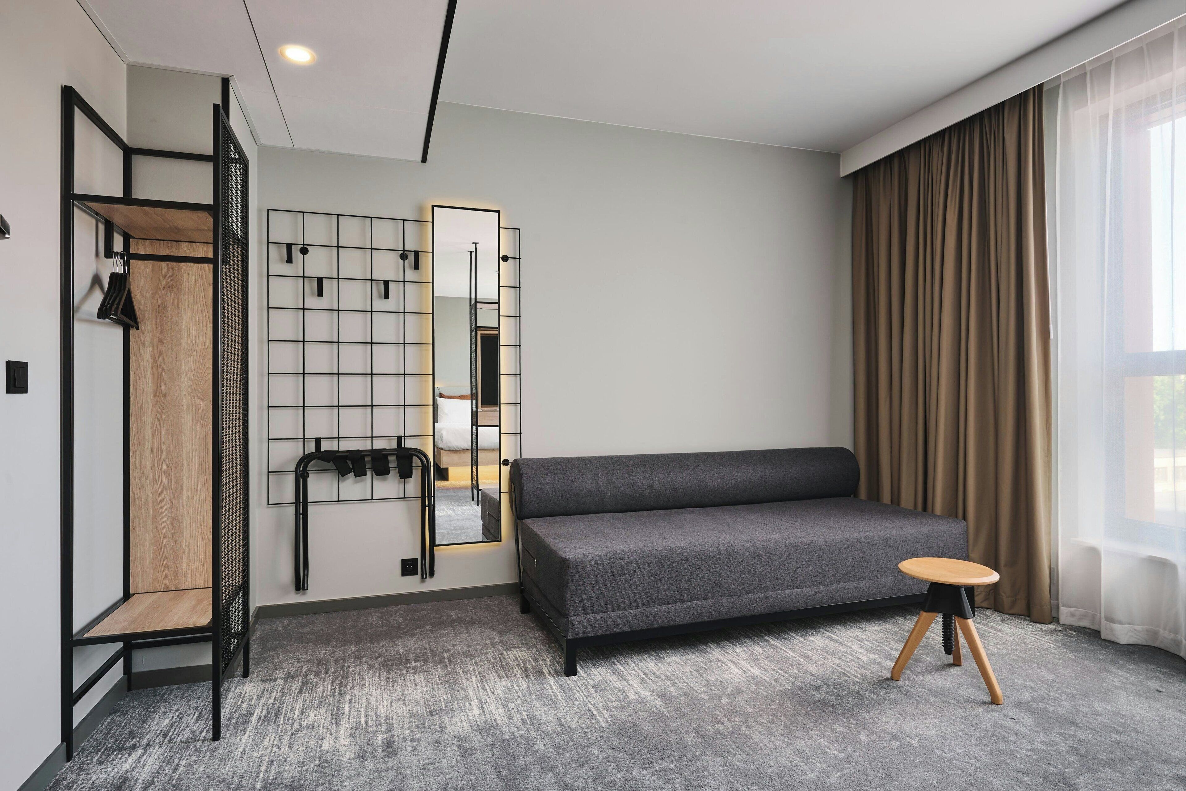 Chambre Deluxe, 1 grand lit et 1 canapé-lit | Bureau, lit parapluie, Wi-Fi gratuit, draps fournis