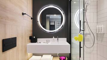 Shower, hair dryer, heated floors, towels