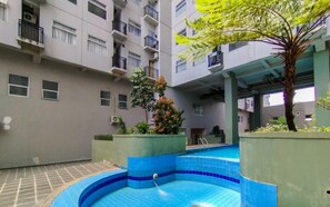 Outdoor pool - Urban Designed 3Br At Grand Asia Afrika Apartment (Bandung)